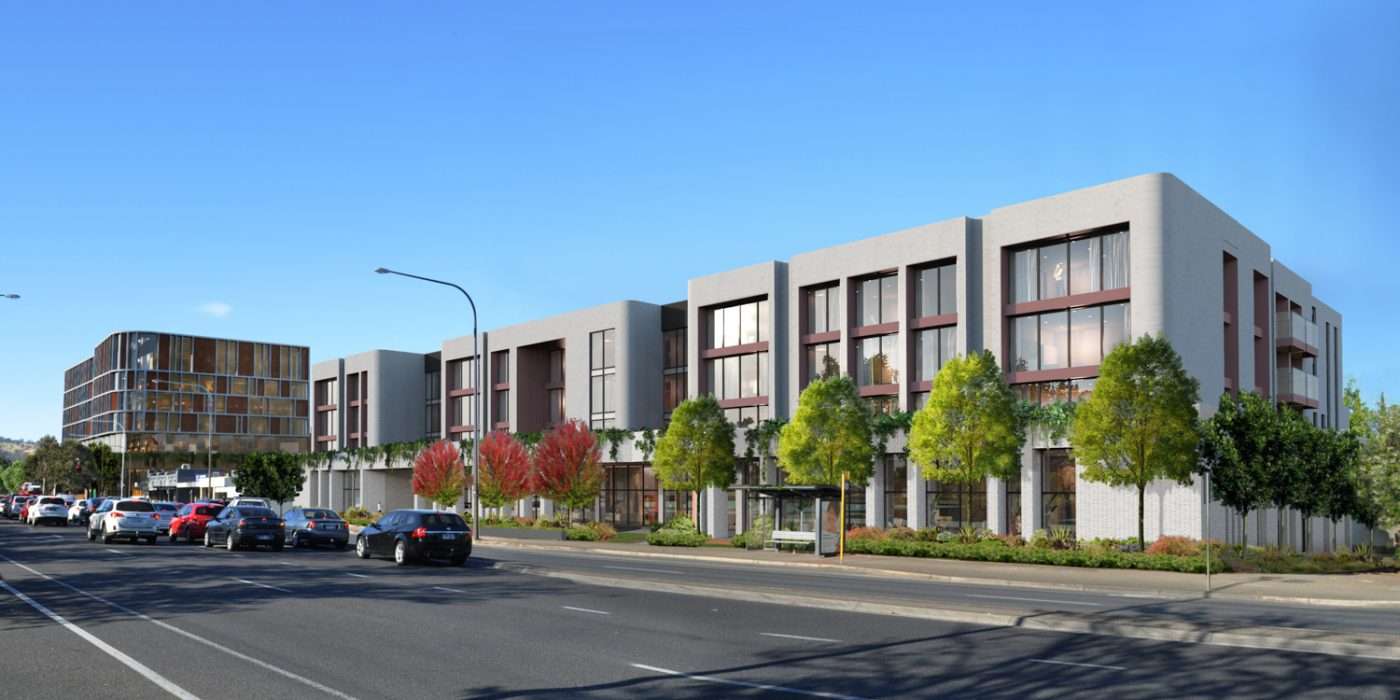 Render of multi story aged care living apartments with 4 lane road with cars in foreground